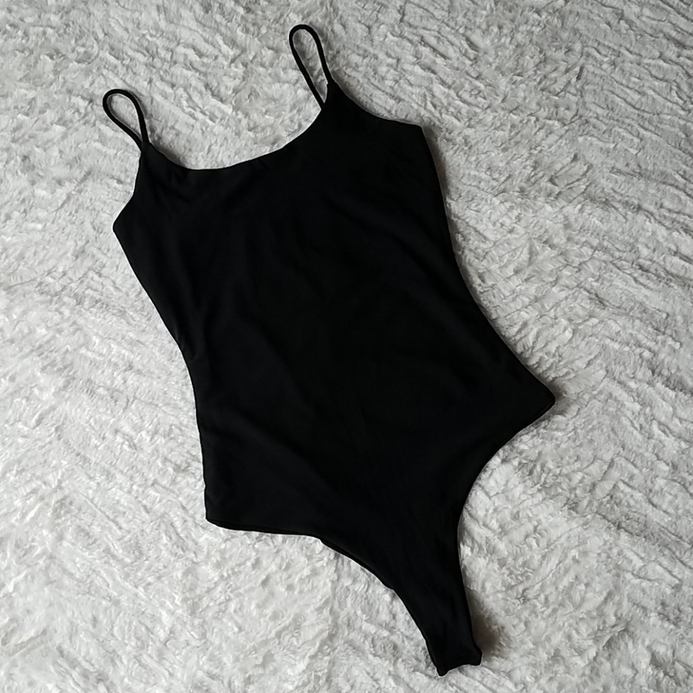 Black stretchy no wrinkle body suit in haul!!!
